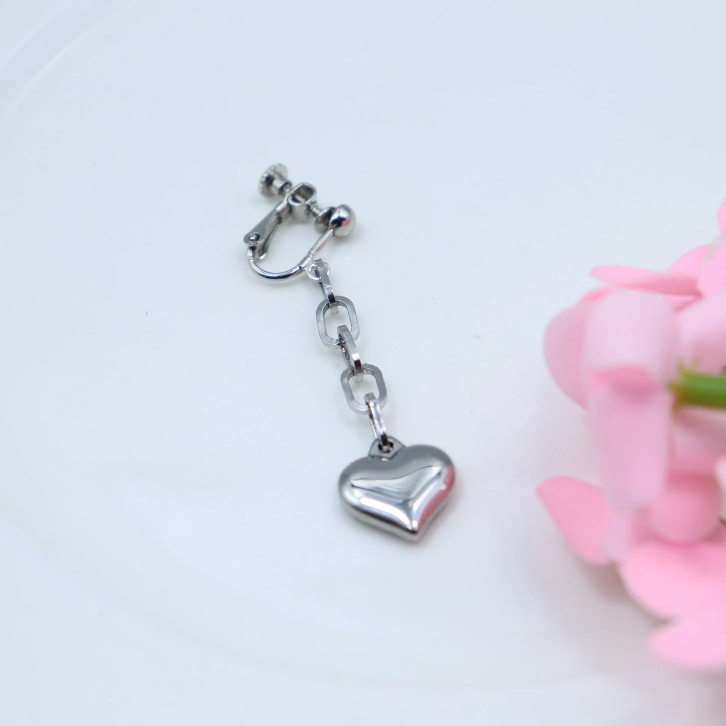 Sinister Chic: Death Note Ryuuku Heart Earrings – Edgy Anime-Inspired Ear Clips